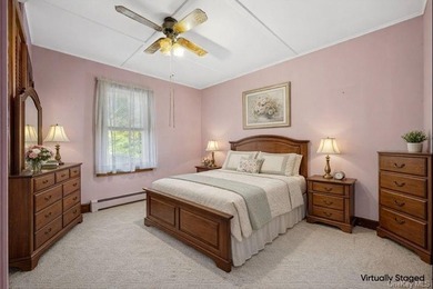 Welcome to 265 Hummel Ave in Southold, a charming two-bedroom - photo 6