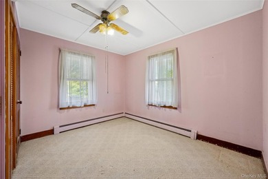 Welcome to 265 Hummel Ave in Southold, a charming two-bedroom - photo 7