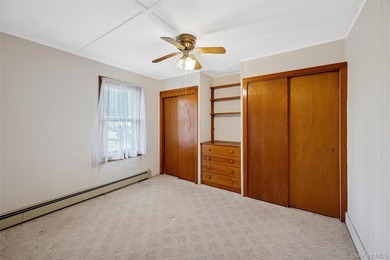 Welcome to 265 Hummel Ave in Southold, a charming two-bedroom - photo 9