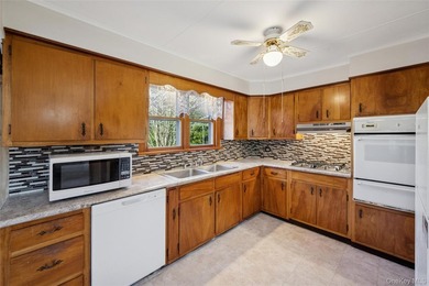 Welcome to 265 Hummel Ave in Southold, a charming two-bedroom - photo 10