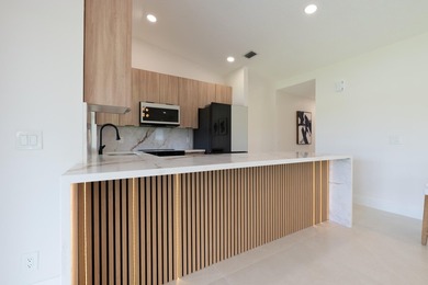 Welcome home to this extensively renovated lakefront home in the - photo 6