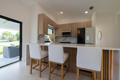 Welcome home to this extensively renovated lakefront home in the - photo 7