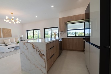 Welcome home to this extensively renovated lakefront home in the - photo 8