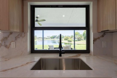 Welcome home to this extensively renovated lakefront home in the - photo 9