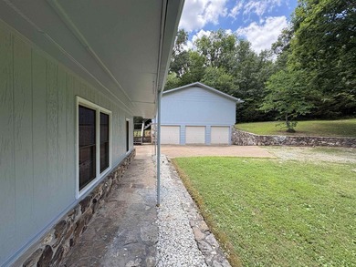 Tucked away on 13.62+/- surveyed acres in the rolling Ozark - photo 41