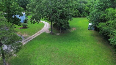 Tucked away on 13.62+/- surveyed acres in the rolling Ozark - photo 48