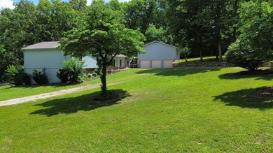 Tucked away on 13.62+/- surveyed acres in the rolling Ozark - photo 49