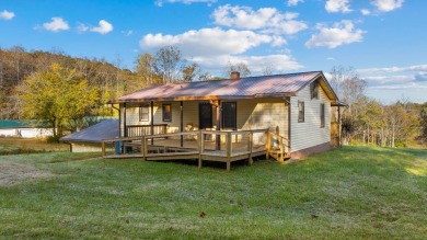This solid 3 bedroom ranch sits on over an acre of rolling