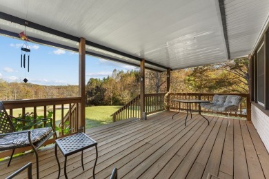 This solid 3 bedroom ranch sits on over an acre of rolling