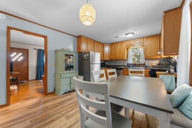 This solid 3 bedroom ranch sits on over an acre of rolling