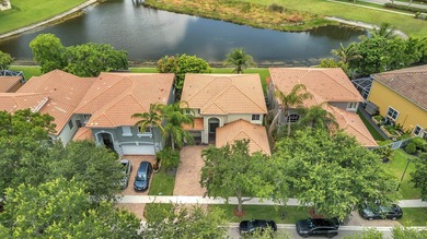 New Price! WPB resort-style lakefront living in this spacious - photo 1