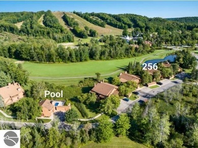 Comfortable in all seasons, this 2-bedroom condominium has