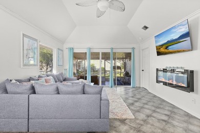 This renovated 2-bedroom, 2-bath condo has a newer roof (2022) - photo 2