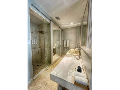 Experience luxury coastal living in this exquisite two-bedroom - photo 12