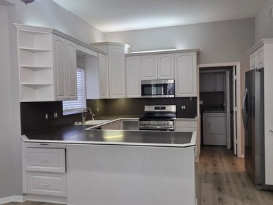 Beautiful 4-bedroom, 2.5-bath two-story lakefront home with a - photo 5