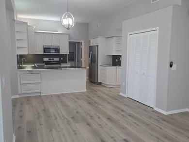 Beautiful 4-bedroom, 2.5-bath two-story lakefront home with a - photo 6