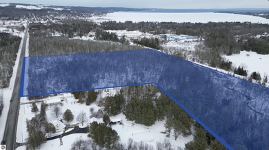 (private lake, pond, creek) Acreage Sale Pending in Suttons Bay Michigan