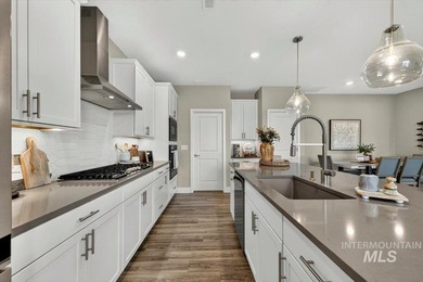 Thoughtfully designed featuring upgrades throughout, this - photo 12