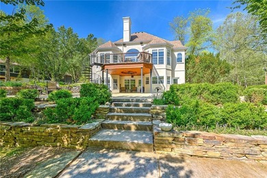Set on a premier lakefront lot along the shores of Table Rock - photo 2