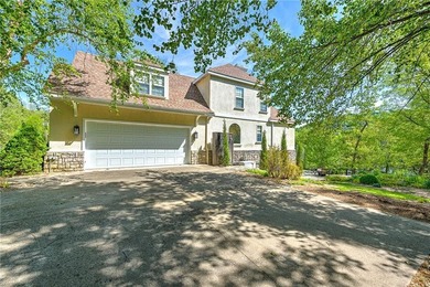 Set on a premier lakefront lot along the shores of Table Rock - photo 3