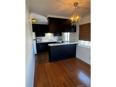 Experience coastal living in Naples' Island! This move-in ready - photo 7