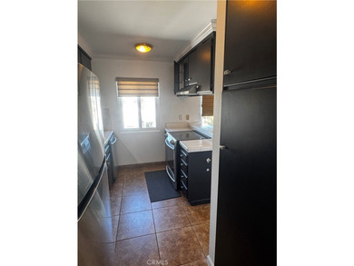 Experience coastal living in Naples' Island! This move-in ready - photo 8