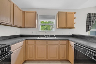 Welcome home to easy, maintenance-free living in this - photo 9