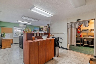 Check out this cozy hotel/cafe with approximately 176' of - photo 9