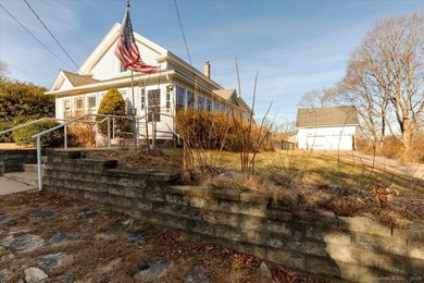 Welcome to 27 Ash Ave - a charming older home offering generous