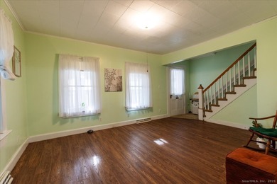 Welcome to 27 Ash Ave - a charming older home offering generous