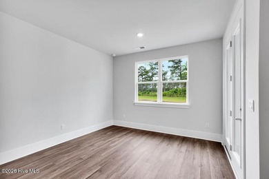 This Acadia floor plan features 1,928 square feet, 3 bedrooms, 3 - photo 22