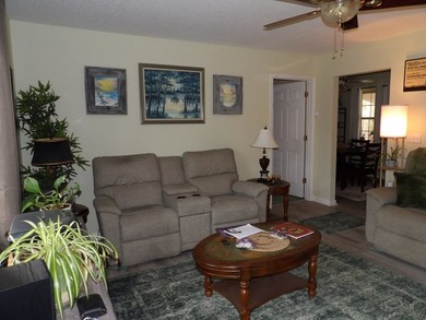 Well-maintained property featuring a 14' RV carport with hookups - photo 3