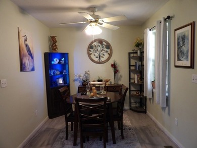 Well-maintained property featuring a 14' RV carport with hookups - photo 5