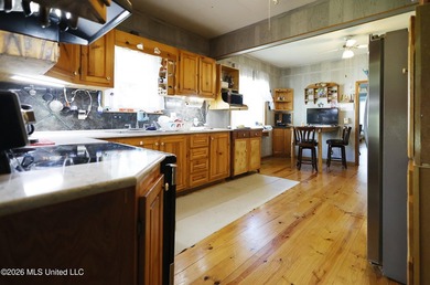 Country home nestled on 4.48 acres, features a pond and ample - photo 7