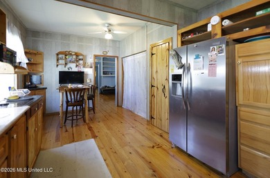 Country home nestled on 4.48 acres, features a pond and ample - photo 8