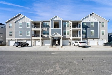 Step into this sleek, main-floor condo located in one of Utah's - photo 2