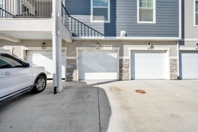 Step into this sleek, main-floor condo located in one of Utah's - photo 3