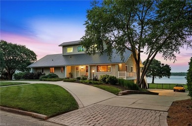 Set on a 1.65 spectacular waterfront lot, this exceptional - photo 1
