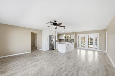 Beautiful waterfront home with spacious newly resurfaced pool - photo 8