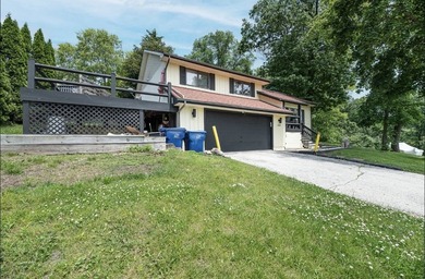Welcome to Lake Life Living! This stunning split-level home in - photo 2