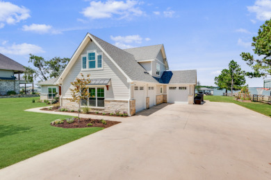 Stunning 6B/3.B/3C Water Front Home with Boathouse on RC Lake! - Lake Home For Sale in Corsicana, Texas