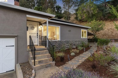 Thoughtfully updated throughout, this single-level home offers a - photo 3