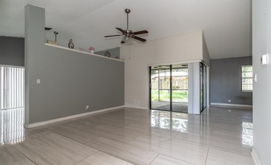 This 3-bedroom, 2-bathroom single-story home offers 1,672 square - photo 4