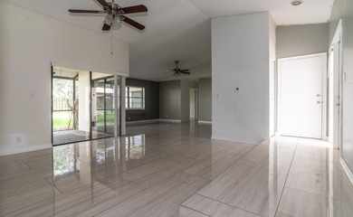 This 3-bedroom, 2-bathroom single-story home offers 1,672 square - photo 5