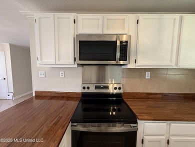 Beautifully remodeled brick ranch just a short walk to the beach - photo 9