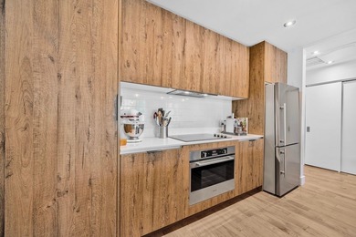 Stunning ground-floor condo in the prestigious Monroe complex in - photo 9