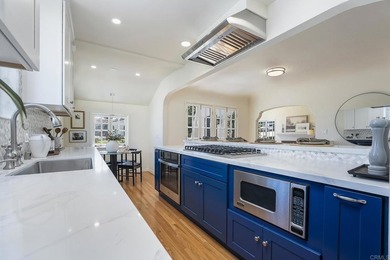 Welcome to this beautifully renovated single level Spanish home - photo 12