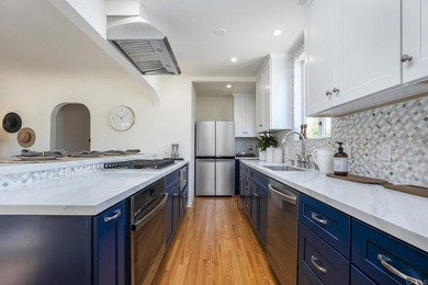 Welcome to this beautifully renovated single level Spanish home - photo 18