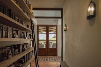 Nestled on 21.77 private acres in Bellevue, this Tuscan estate - photo 28