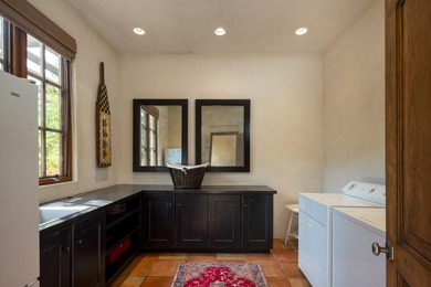 Nestled on 21.77 private acres in Bellevue, this Tuscan estate - photo 29